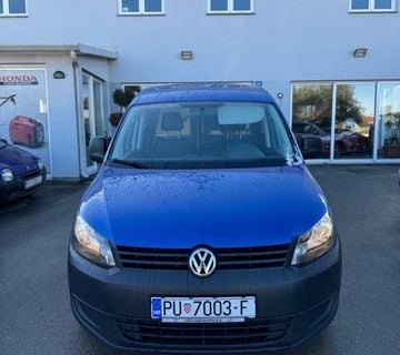 VW Caddy 1,6 TDI  - cover