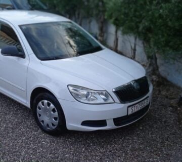 Škoda Octavia 2011,1.6 TDI - cover