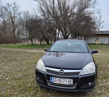 Opel Astra 1.6 2008 - cover