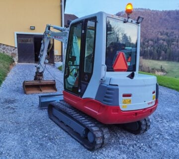 Takeuchi TB 235 HYDRAULIC QUICK CHANGE nagibna blanjalica - cover