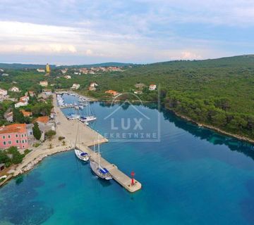 Građevinsko zemljište pov. 865 m2, 2. red od mora, otok Molat (Brgulje - cover