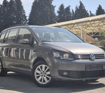 VW Touran 1,6 TDI 6 BRZINA SERVISNA NAVI OPS PARKING SENZORI BLUETOTH - cover