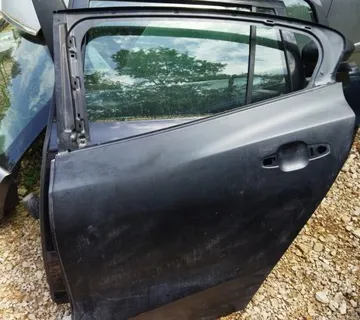 FORD FOCUS MK4 18-ZADNJA LIJEVA VRATA NOVA - cover