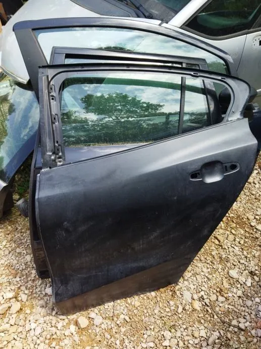 FORD FOCUS MK4 18-ZADNJA LIJEVA VRATA NOVA - cover