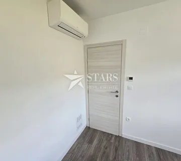 Buzet, 1S+DB stan u novogradnji, centar - cover