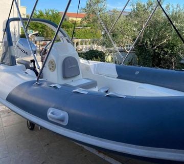 Ris marine model 480 sport + HONDA 50KS - cover
