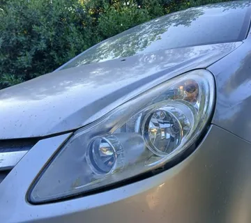 OPEL CORSA D 2010 FAROVI - cover