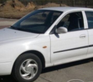 Kia Shuma 1997 - bočne letvice  - cover