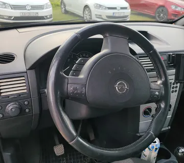 Opel Meriva - cover