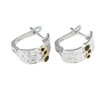 Srebrne naušnice Laney - cover