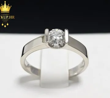 ZLATNI PRSTEN S DIJAMANTOM 0.32ct 18K / R1, RATE ! - cover