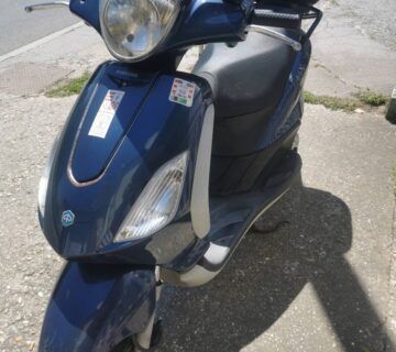 Piaggio skuter 2014 - cover