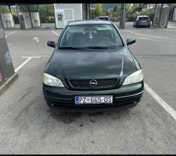 Opel astra - cover