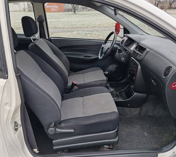 Daihatsu Cuore 1.0 Benzin 2004 god Reg 25.10 .2025  - cover