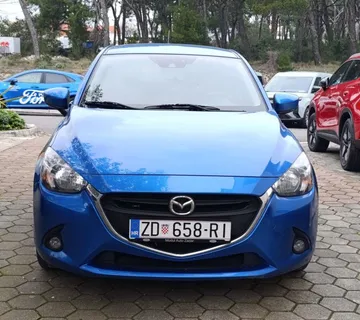 Mazda 2 D21 - cover