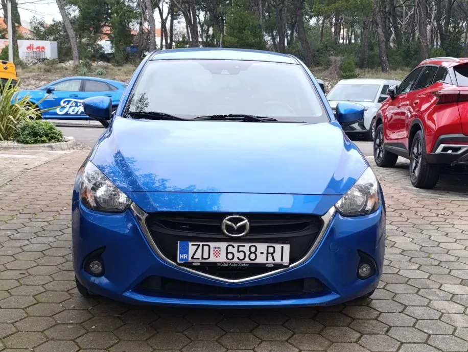 Mazda 2 D21 - cover