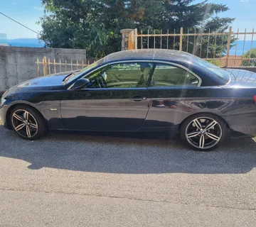 BMW 330d Cab Lux 2009 g. - cover