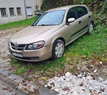 Nissan almera - cover