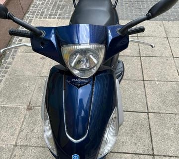 PIAGGIO FLY 100 2009.g. OGLAS IZ USLUGE - cover