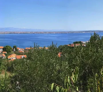 GRAĐEVINSKO ZEMLJIŠTE S IDEJNIM PROJEKTOM ZA VILU S BAZENOM, POGLED NA MORE - PREKO, UGLJAN - cover