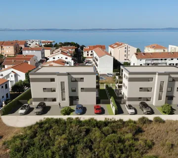 APARTMANI U BLIZINI PLAŽE, ZGRADA 2. NOVOGRADNJA, 150 m OD MORA - PRIVLAKA - cover