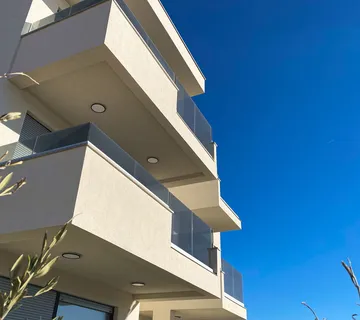 APARTMANI U STAMBENOJ ZGRADI NOVALJA,PAG - cover