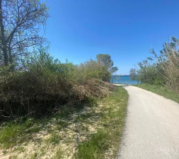 GRAĐEVINSKO ZEMLJIŠTE - 1362 m2, PRVI RED DO MORA!!! IZVRSNA PRILIKA! RAŽANAC - RTINA - cover