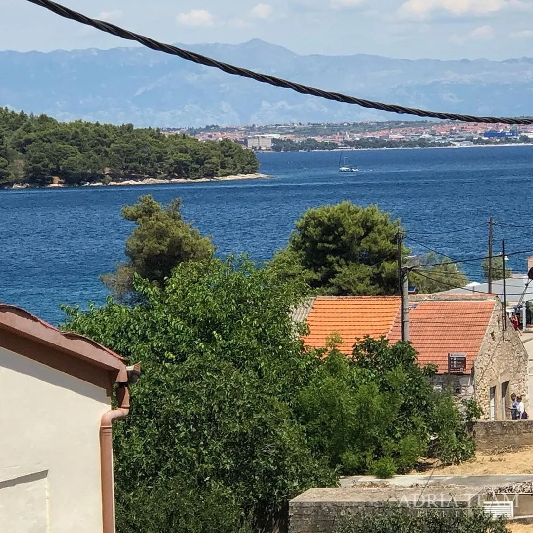 GRAĐEVINSKO ZEMLJIŠTE S PRISTUPNIM PUTEM I POGLEDOM NA MORE - KALI, UGLJAN - cover