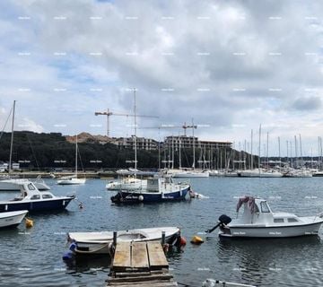 Prodaja modernih stanova u eksluzivnoj zgradi sa pogledom na marinu - cover
