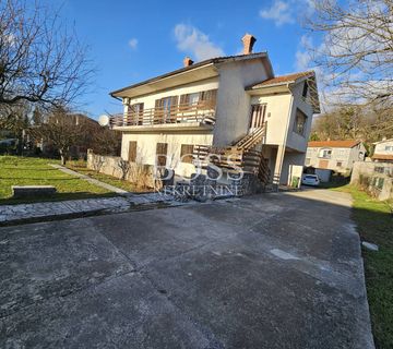 Podhum, samostojeća kuća s dva stana i dvije garaže - cover