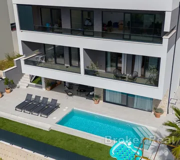 Luksuzna moderna kuća s tri stambene jedinice i otvorenim pogledom na more - Makarska