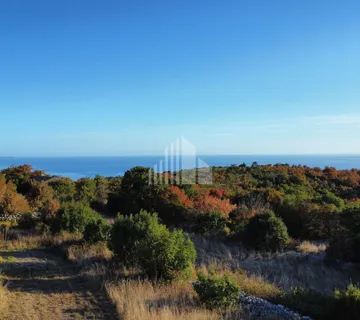 Atraktivno građevinsko zemljište s dozvolom i pogledom na more - cover