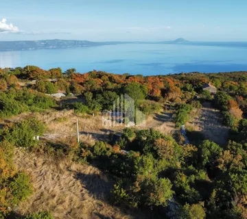 Atraktivno građevinsko zemljište s dozvolom i pogledom na more - cover