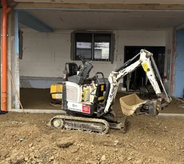 NAJAM mini bagera BOBCAT E10, 1.100kg, širina 710mm - cover