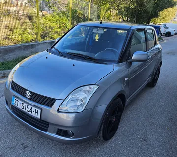 SUZUKI SWIFT 1.3 - cover