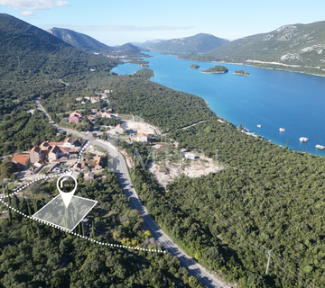 ZAMASLINA, PELJEŠAC - građevinsko zemljšte 587 m2 s pogledom na more - cover