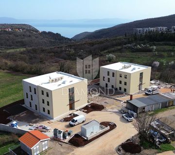 Labin, luksuzni stan u novogradnji s pogledom na more - cover