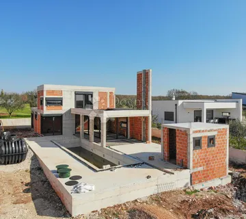 Kanfanar, luksuzna villa u roh-bau fazi s pogledom na more - cover