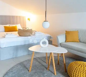 Uhodano poslovanje - 4 apartmana - PRILIKA! - cover