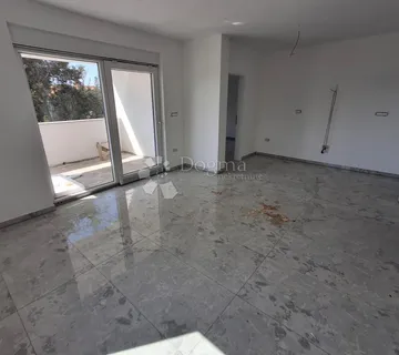 Dvosobni apartman u novogradnji na top lokaciji. Barbat - cover
