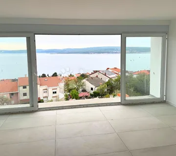 Novogradnja kuća s 4 stambene jedinice i pogledom na more u Crikvenici - cover