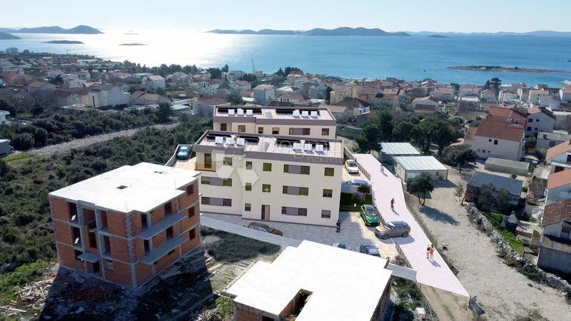 Novogradnja Pakoštane s pogledom na more - cover