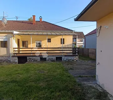 Kuća u srcu Đakova s terasom i okućnicom! - cover