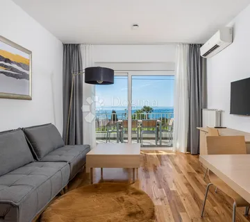 Ičići najam stan s pogledom na more i bazenom - cover