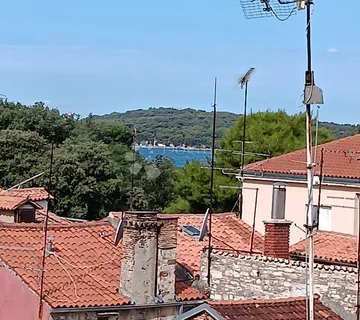 Dvosoban stan s karakterom i vrtom u srcu Pule – idealno za život ili investiciju - cover