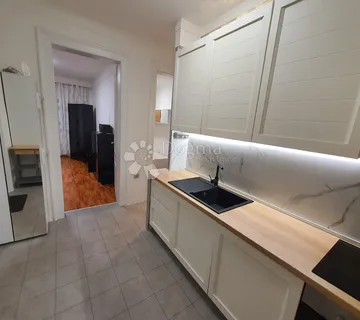 Atraktivni stan sa okućnicom na traženoj lokaciji - cover