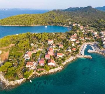 GRAĐEVINSKO ZEMLJIŠTE - EKSKLUZIVNI PROJEKT SA 9 VILA PRVI RED DO MORA - cover