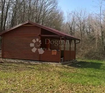 Parcela sa malom kućicom - cover