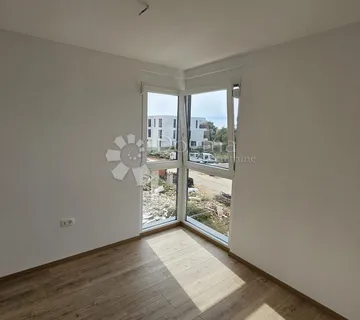 Prekrasan Stan u Novogradnji sa garažom 300 m od plaže! - cover