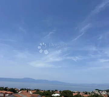 OTOK KRK-Kuća s tri stambene jedinice i garažom - cover